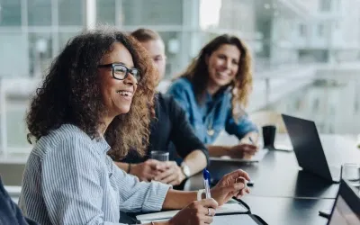 Woman his presenting on digital board