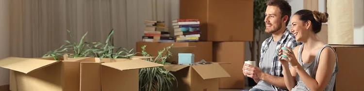 A man and women sitting and having coffee