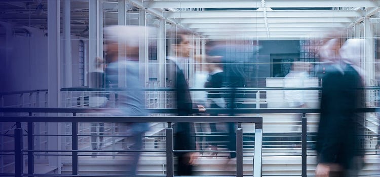 High speed image of people moving around