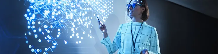 A women explaining using a digital presentation.