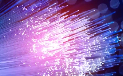 Fiber optic cable featuring glowing blue and purple lights, creating a striking visual effect.