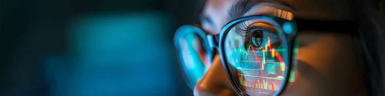 reflection on a person's eye glass