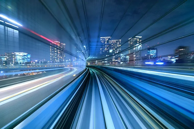 Motion blur of train moving inside tunnel