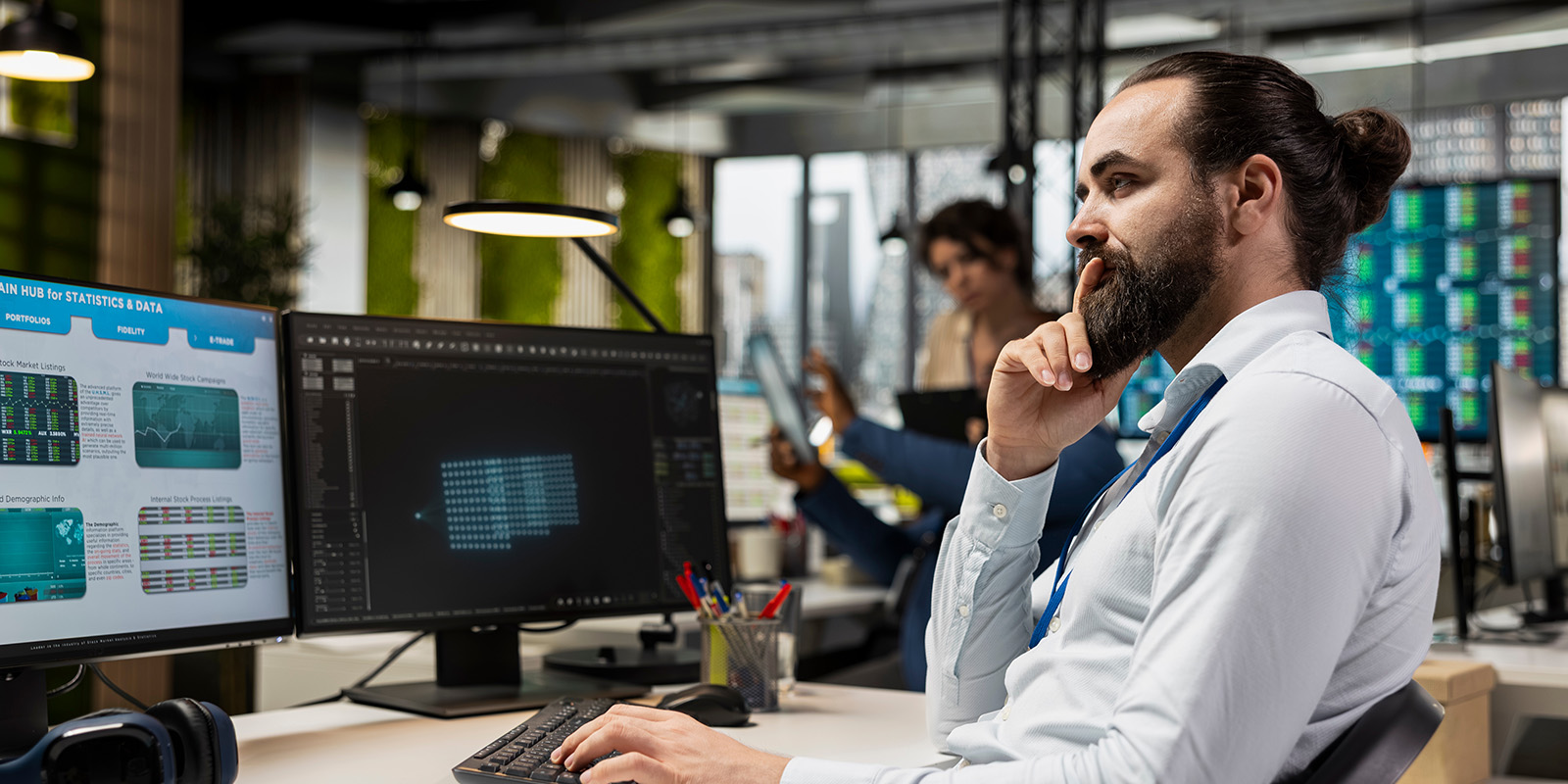 someone looking like networkchuck thinking behind a PC