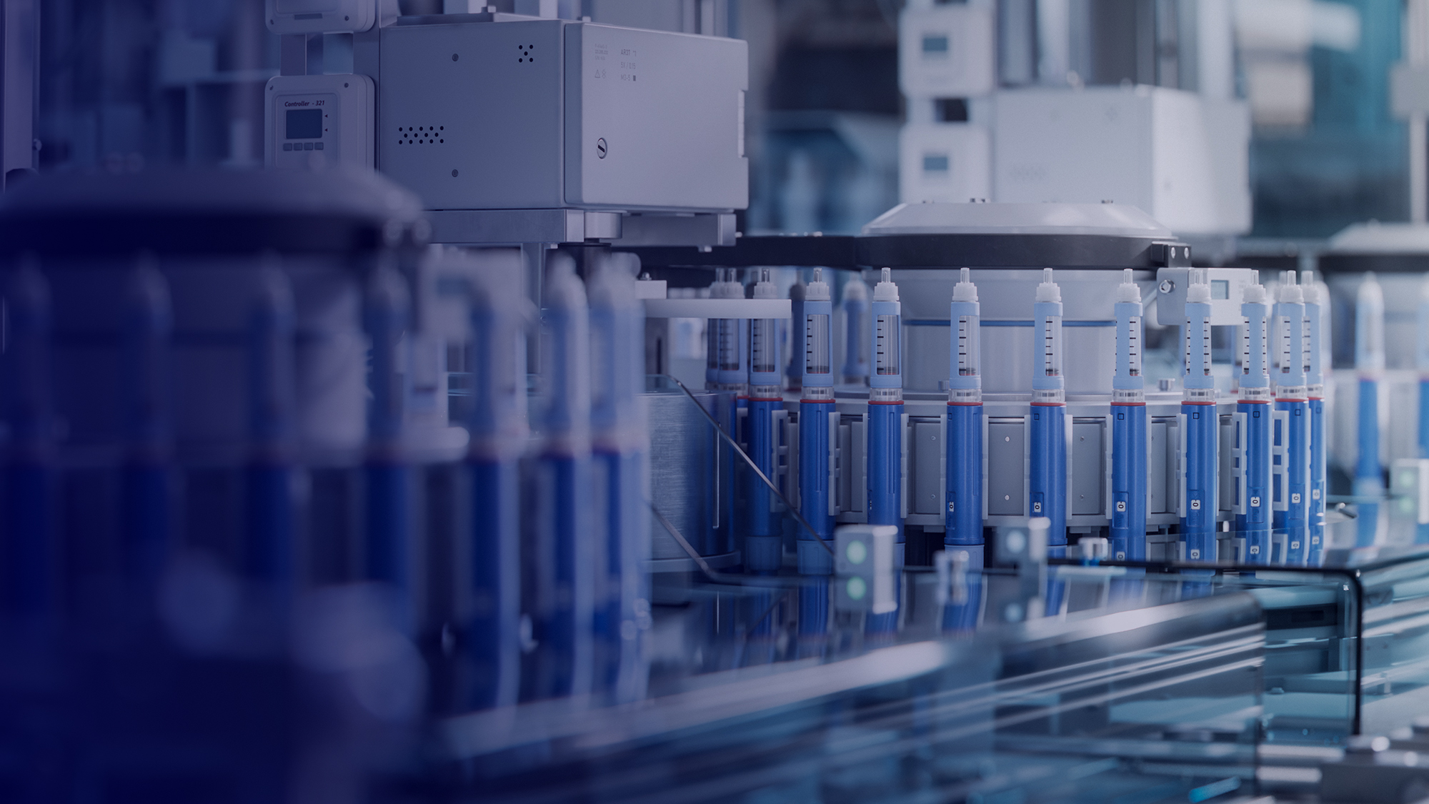 Medical Drug Production Plant. Insulin Injection Pens on Conveyor Line during Production Process at Modern Pharmaceutical Factory. Weight Loss Medication Manufacturing.