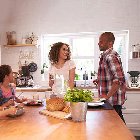 A family around a table in conversation