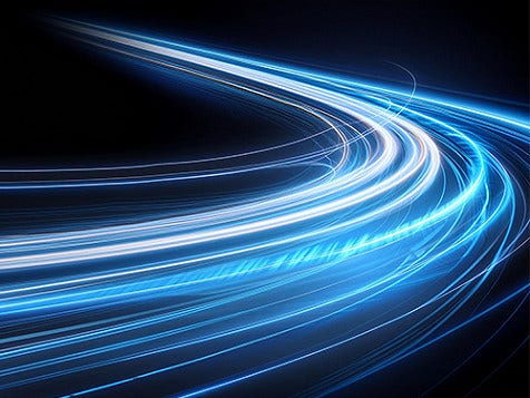 A bunch of blue-hued curved light streahs