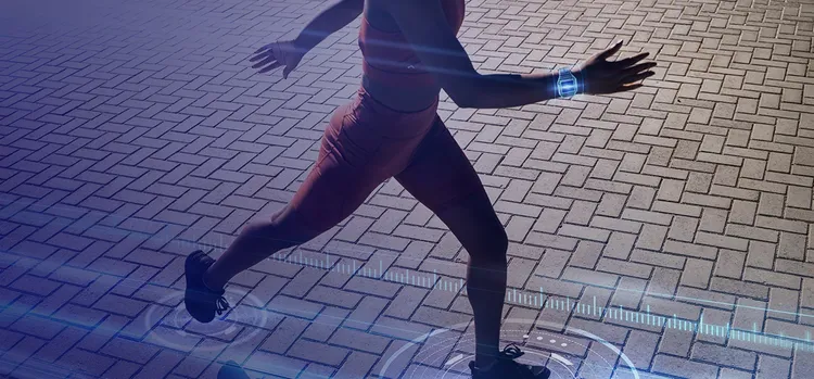 A man running wearing health gadgets