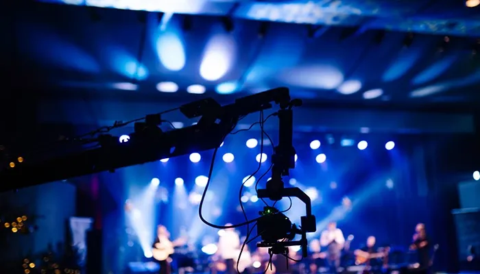 A camera positioned on a event stage.