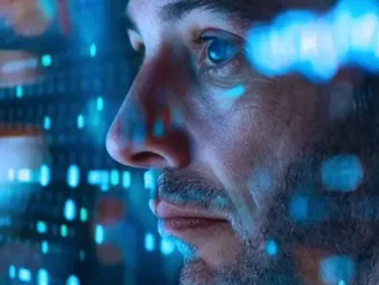 Close-up of a person’s face with blue digital data reflections.