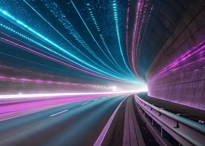An abstract image colorful lights against a dark background forming a tunnel like structure