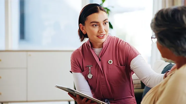 Female doctor having a conversation with a patient.