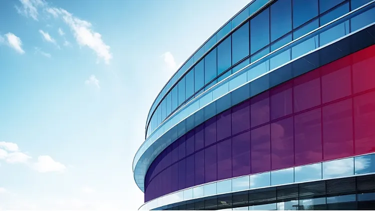 A building with a illuminated ribbon.