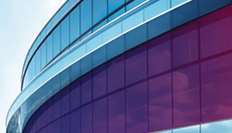 An outside side view of a circular building