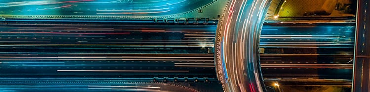 Top angle view of expressway with highspeed traffic.