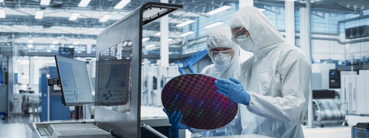 Two Specialists In Sterile Suits Taking Out Silicon Wafer From Soldering Jet Printer And Checking It.