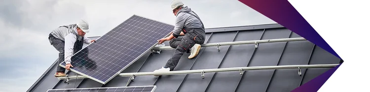 Two person fixing solar pannel