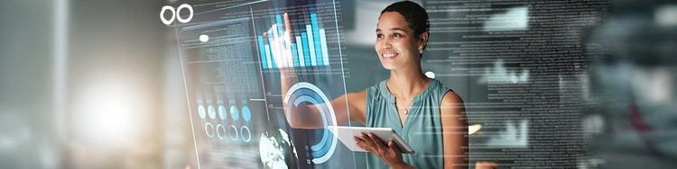 A woman interacting with a digital screen