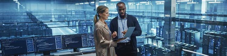 A dynamic wave of blue and red lights illuminates the air, creating a vibrant and colorful display.