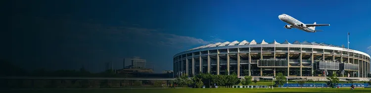 A flight taking off over an airport