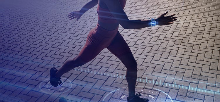 A man running wearing health gadgets