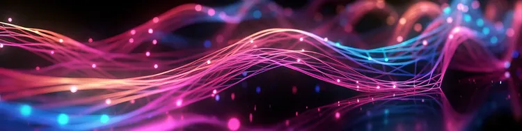 Abstract image of intertwining colorful neon lights and lines on a dark background.