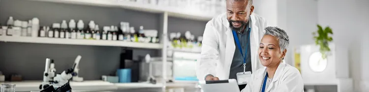 A woman and man working in a laboratory