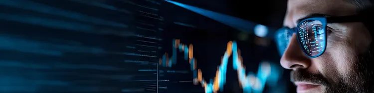 A blue and green fiber optic line illuminated against a dark background, showcasing vibrant colors and intricate patterns.