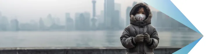 A child was wearing mask, sweater and gloves