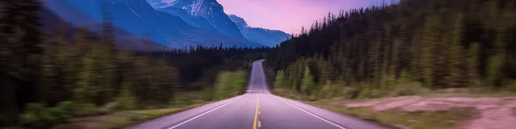Scenic road in the Canadian Rockies while Sunset