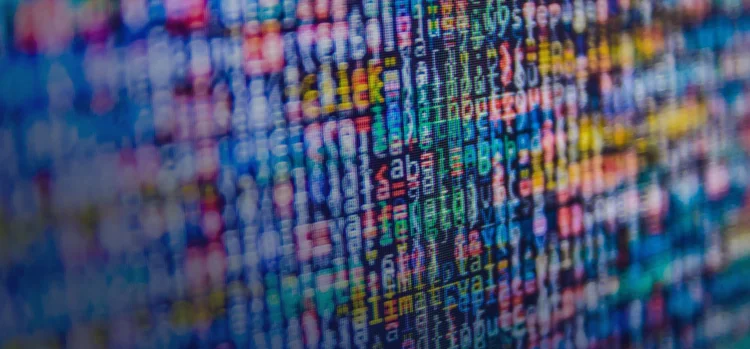 Blurred alphabets and symbols on a screen
