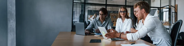 Colleagues discussing in office