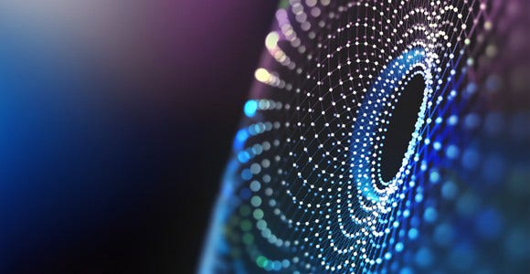 Abstract digital network forming a circular vortex in blue and purple tones