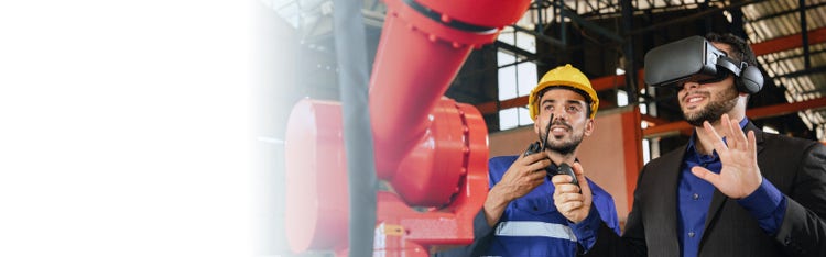 workers operating machinery and using a VR headset