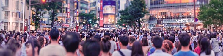 Japanese people walking in a city