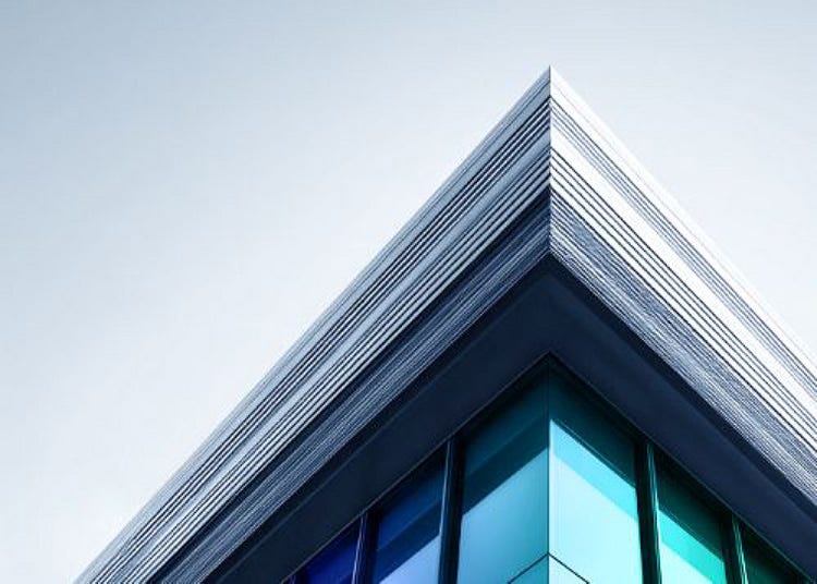 Low-angle view of a modern glass building